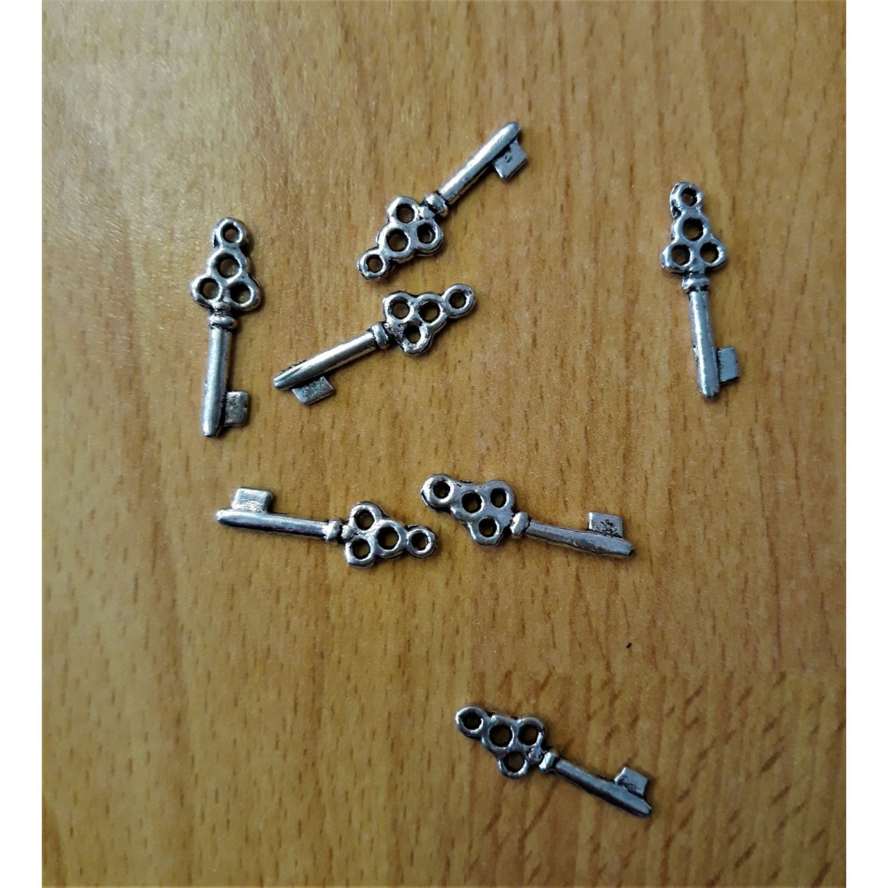 Kovový přívěsek klíček průměr 0,7 cm Kovový přívěsek klíček průměr 0,7 cm